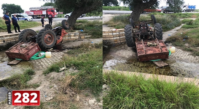 Devrilen traktörün altında kalan sürücü ağır yaralandı